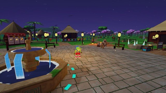The village lit by lanterns at night